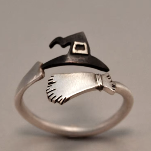 Anello con cappello da strega e scopa in acciaio ipoallergenico e smalto nero per Halloween